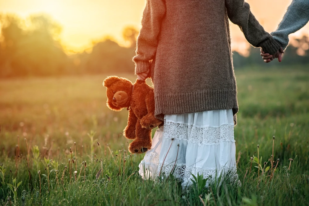Child and Teddy Bear
